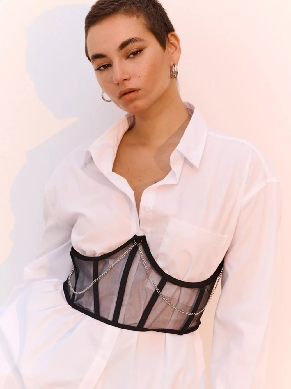 Sheer lace mesh corset black open cup push up chain tie back top.